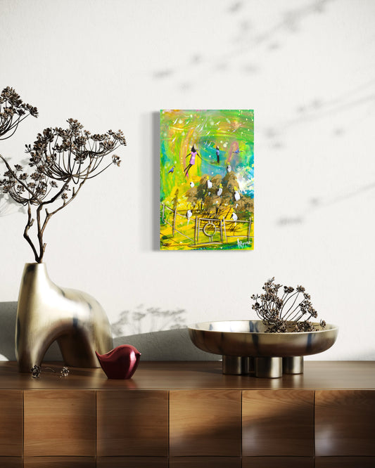 The Gateway by Adam Bogusz displayed on a white wall above a timber sideboard styled with a brass vase, dried seed heads and a red bird ornament, shown to indicate scale.