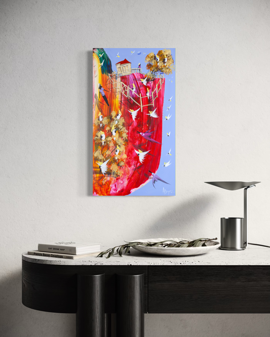 Still in Sight by Adam Bogusz hanging unframed on a pale wall above a black and travertine console with books, a stone bowl and a metal lamp, showing the scale of the painting in a room.