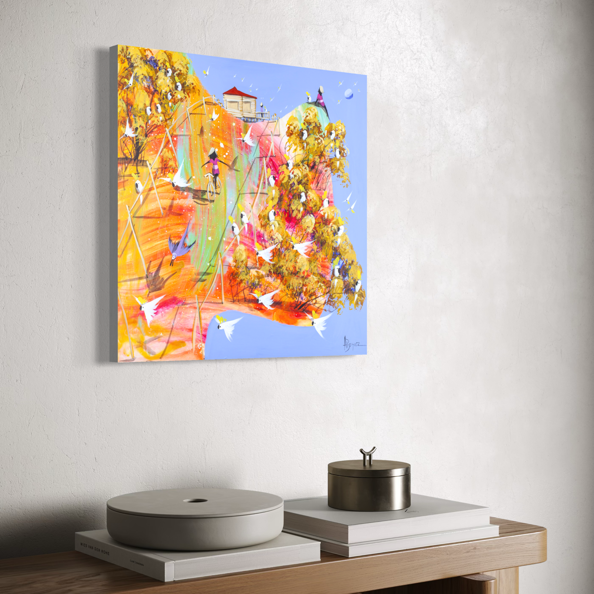 Angled view of Lost and Found by Adam Bogusz on a white wall above a timber sideboard, showing the depth of the board edge.
