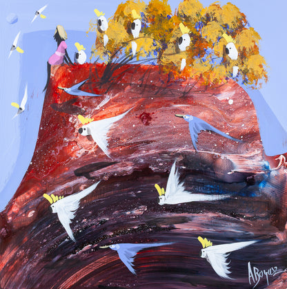 Above the Rush, original acrylic painting on board by Adam Bogusz. Deep red and burgundy landscape against a soft blue sky, with a woman in pink sitting at the edge beside a single sulphur crested cockatoo while the flock sweeps through the dark ground below.