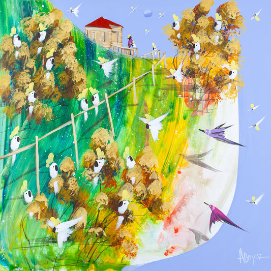 What Stays, original acrylic painting on board by Adam Bogusz. Green and gold hillside against a soft blue sky, with a red roofed house at the top and a woman in pink at the verandah rail beside a single cockatoo, a fence running down the slope and sulphur crested cockatoos filling the trees below.