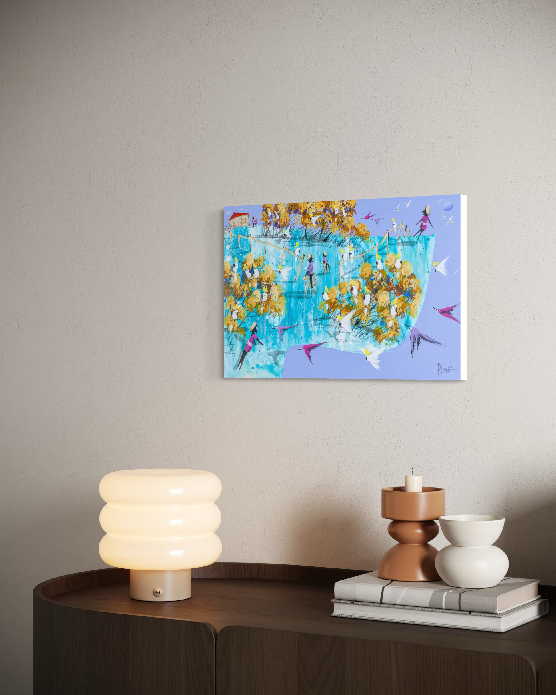 Already Here by Adam Bogusz shown at an angle on a pale wall above a timber sideboard with a glass lamp and ceramics, to indicate scale.