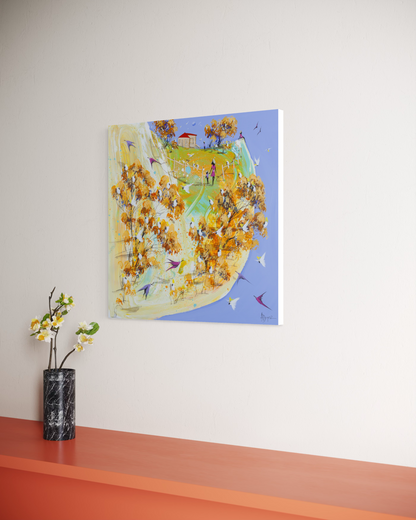 The Long Walk Home by Adam Bogusz displayed on a pale wall above an orange ledge styled with white blossoms in a black marble vase, shown to indicate scale.