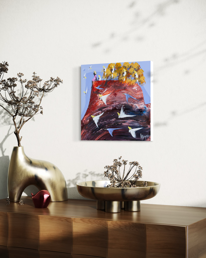 Above the Rush by Adam Bogusz hanging unframed on a pale wall above a timber sideboard with brass vessels, seen at a slight angle so the depth of the painted board is visible.