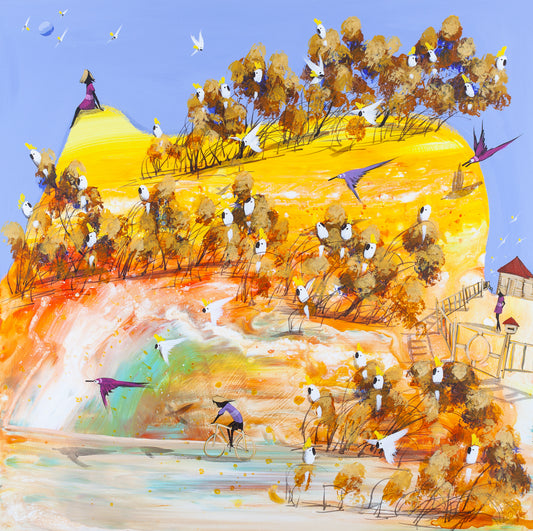 Always There, original acrylic painting on board by Adam Bogusz. A golden hill under a light blue sky, with a woman in pink seated alone on the peak, a boy in purple riding a bicycle across the foreground and sulphur crested cockatoos gathered in ochre trees, a pink bird and a purple bird crossing the slope.