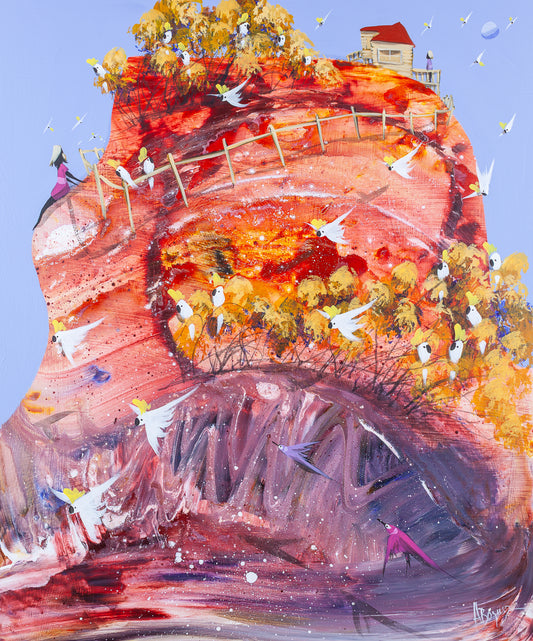 The Wiggly World by Adam Bogusz, expressive acrylic painting on MDF board. A great swirling hill of red, orange, pink and purple rises against a soft blue sky, its surface poured in rolling curves. A timber fence runs along the ridge to a cottage with a red roof, where a small figure in pale purple stands on the verandah, while a girl in a pink dress sits at the far left edge with her legs over the side. Golden gum trees full of sulphur crested cockatoos crown the hill and wrap around its middle, with white