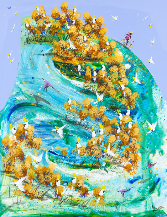 Freewheeling, original acrylic painting on board by Adam Bogusz. Turquoise and green landscape rolling downhill under a soft blue sky, with a woman in pink riding a bicycle along the crest and sulphur crested cockatoos gathered through golden ochre trees.