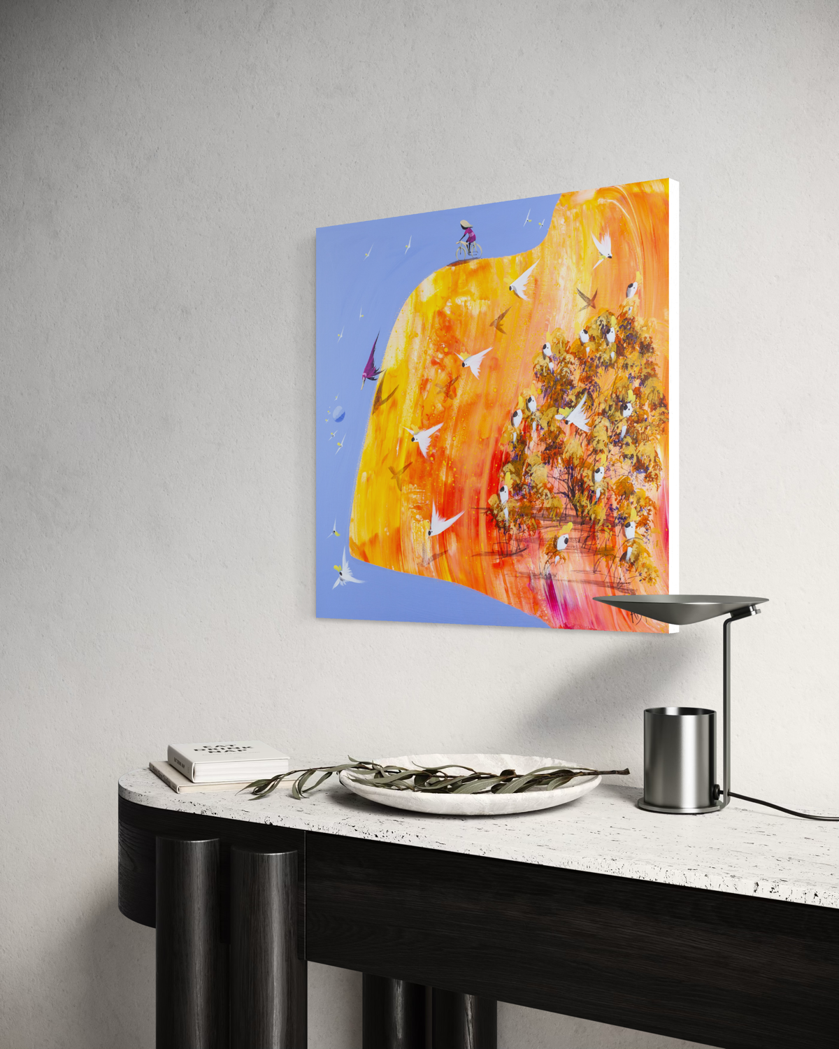 Angled view of This Is It by Adam Bogusz on a white wall above a black console with a stone top, showing the depth of the board edge.