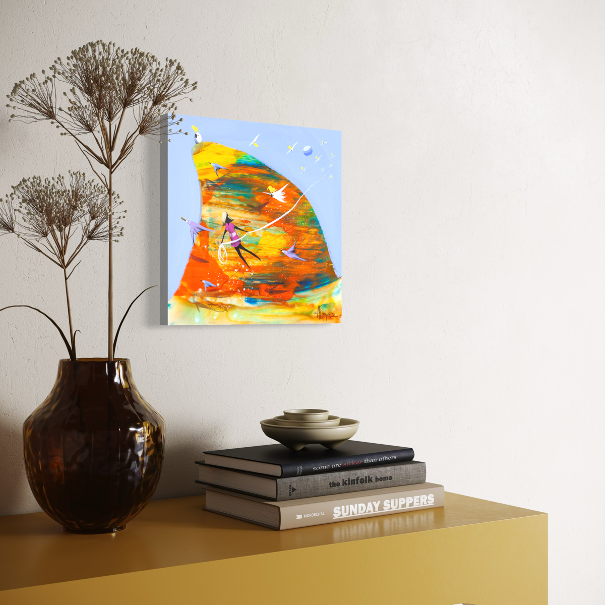 Angled view of Carried Away by Adam Bogusz on a cream wall above a mustard yellow sideboard, showing the depth of the board edge.