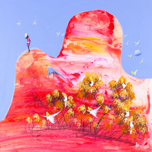 No Need to Climb, original acrylic painting on board by Adam Bogusz. A great red and pink rock rises against a soft blue sky, with a girl in magenta standing on its lower shoulder looking up at the higher peak, golden trees full of sulphur crested cockatoos across its base, a blue bird diving and a small pale moon among the birds in flight.
