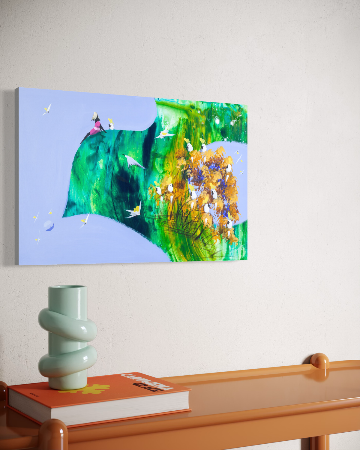 Angled view of Out on a Limb by Adam Bogusz on a cream wall above a glossy orange console, showing the depth of the board edge.